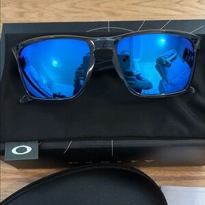 NWT and box Oakley Reflective Blue Sunglasses
